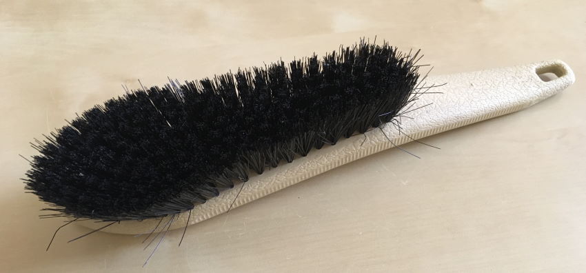 Shoe brush for cleaning eraser debris